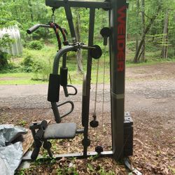 Weider Exercise Machine And Century Punching Bag.
