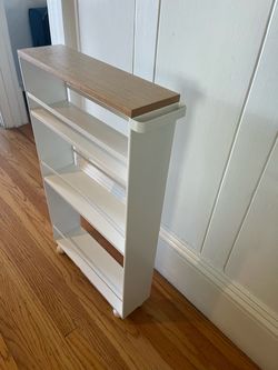 Small rolling set of 3 shelves 32 H by 19 L by 5.25 W