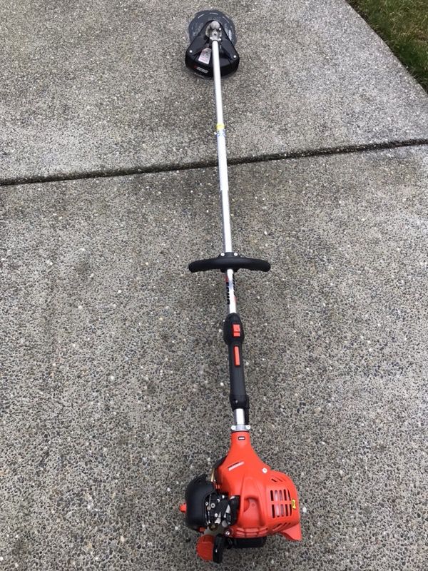 Echo SRM-225 2-cycle gas trimmer weed eater with metal and string blade