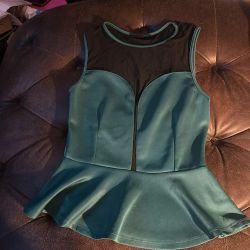Teal and black mesh peplum top from the brand Iris Los Angeles(medium)