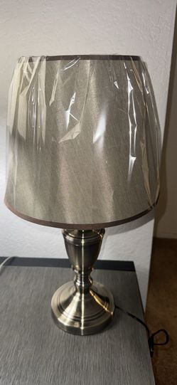 Fancy Tan fabric lamp with brown trim and nickel finish