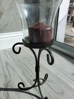 Candle holder with candle