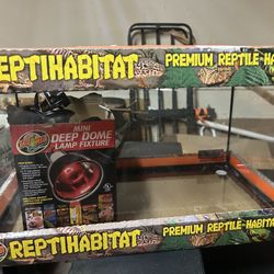 Zoo Med ReptiHabitat Bearded Dragon Starter Kit.  It includes a 20-gallon terrarium habitat. The kit comes with essential lighting and heati