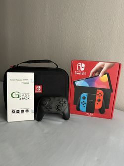 Nintendo Switch Oled + 128 GB SD card + Pro Controller & More