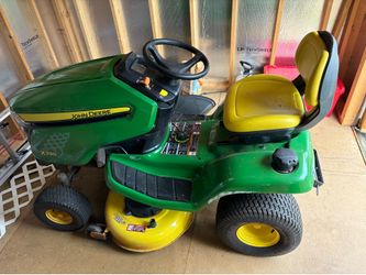 John Deere X330 Riding Mower w/ 42” Deck & Dual Bagger — Only 91 Hours