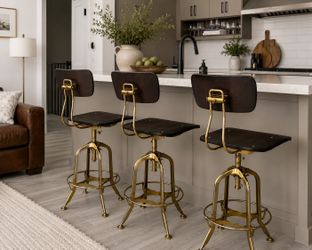 Restoration Hardware- adjustable toledo bar stools (3 available, $100 each)