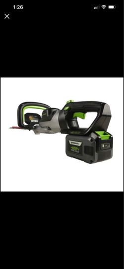 New in box greenworks hedge trimmer with battery and charger
