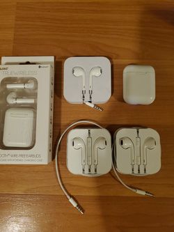 Lot of 5 iphone bluetooth earbuds Brand New.