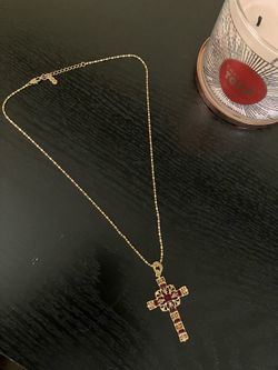 Goldtone Red Rhinestone Cross necklace.
