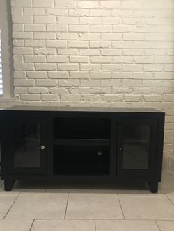 Black tv stand with cabinets