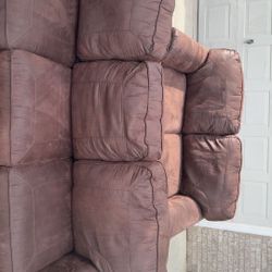 Brown Couch  And Fireplace 
