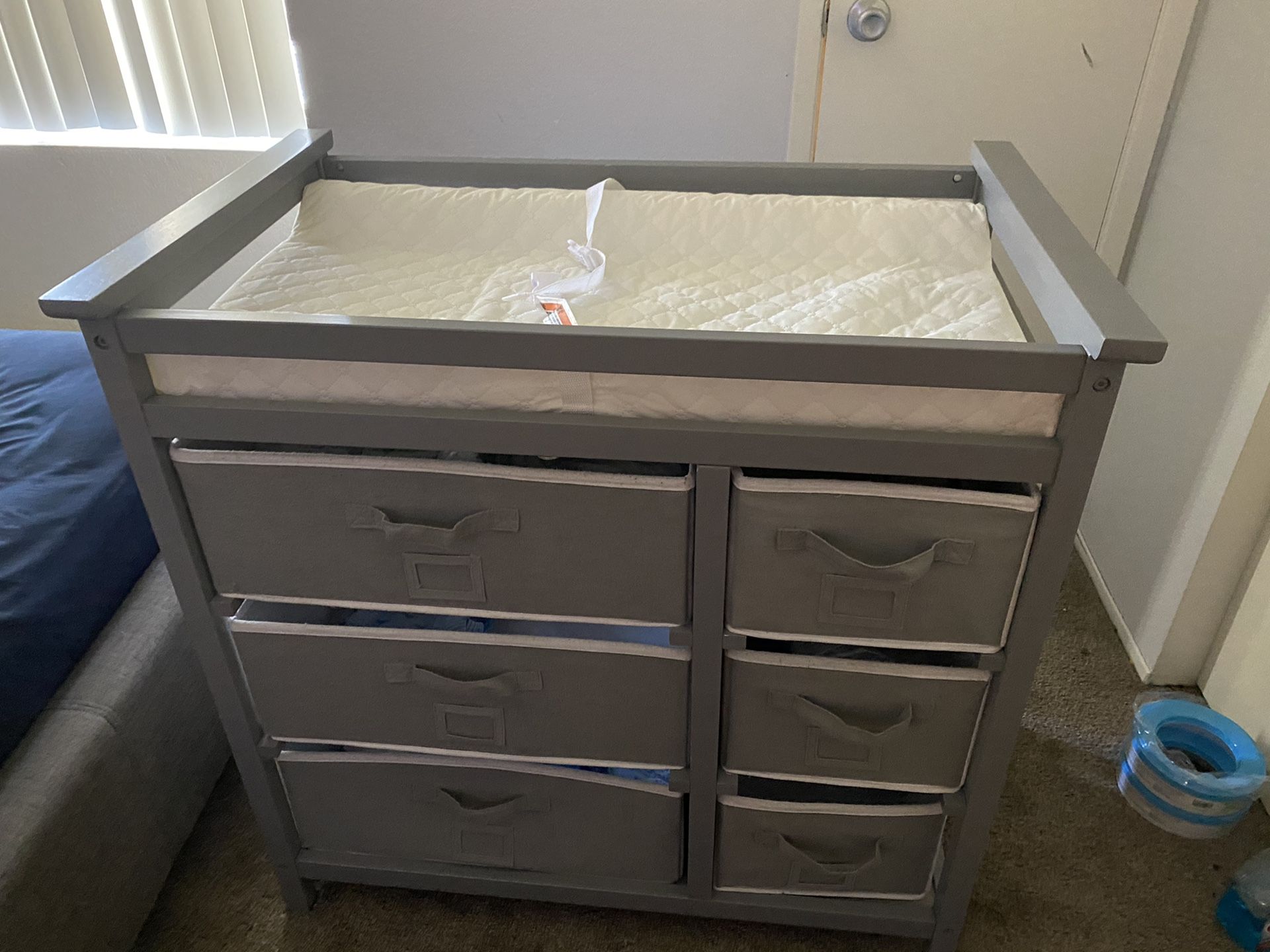 Changing table with pad