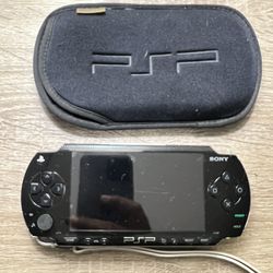 Psp + Charger + Games/movies