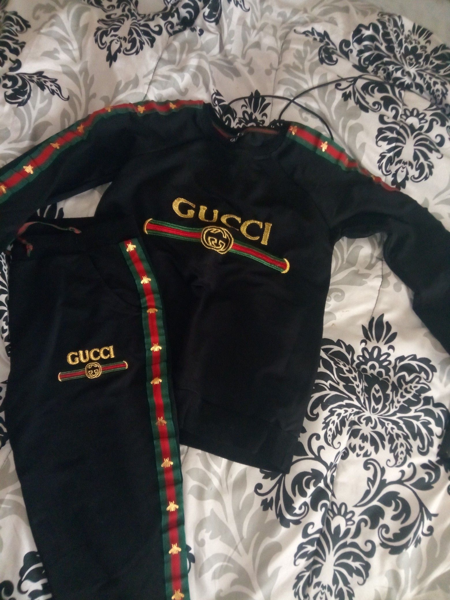 Small woman's Gucci light sweat suit