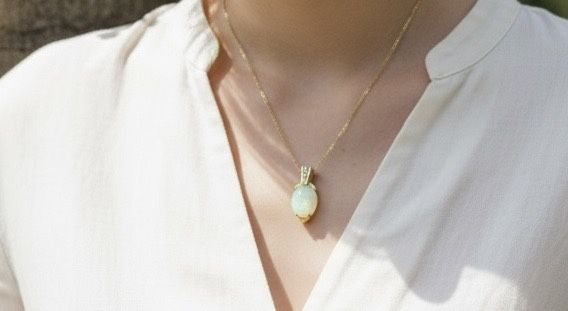 14 K Gold pendant with Australian Opal and Diamonds 
