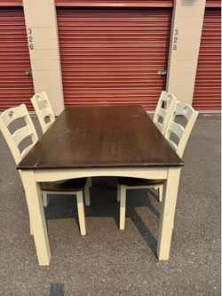 Wooden table and four chairs