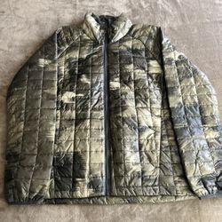 The North Face women's jacket, size L, practically new.
