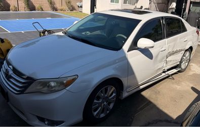 Toyota Avalon White Sedan — Side Damage