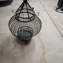 large bird cage or decorative item