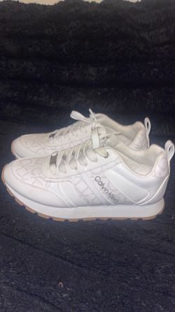 These are Calvin Klein and are a size 6M color white