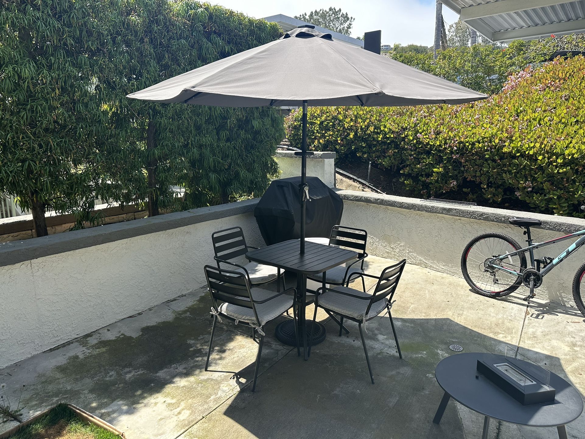 Outdoor Table, Chairs, and Umbrella 