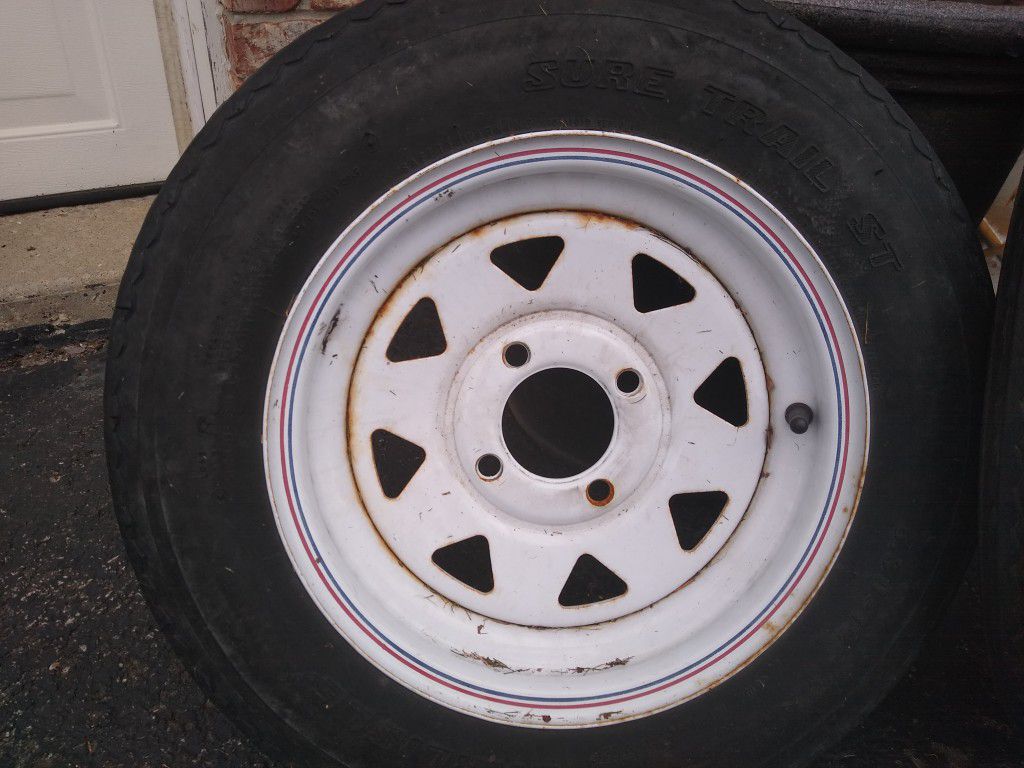 Trailer tires and rims. Brand and size on the pictures.