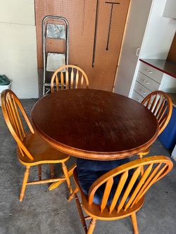 Round dining table with chairs