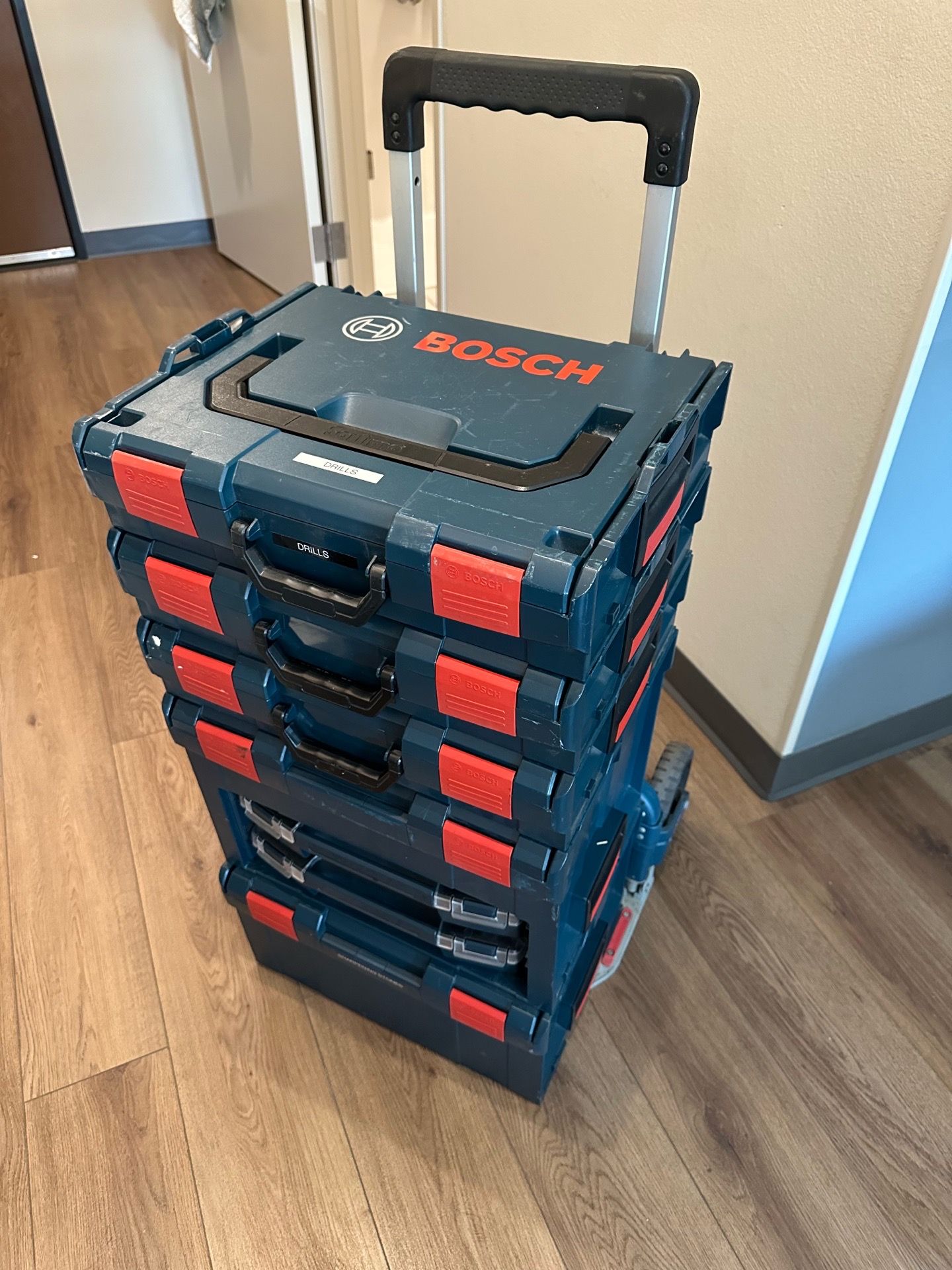 Bosch tool storage stackable tool box chart with some tool and parts