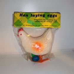 Vintage 60s/70s Hen laying eggs plastic toy in original package