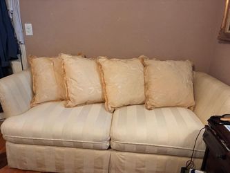 Cream Striped Upholstered Sofa with Throw Pillows
