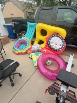 Pool floaties and ball toss game for the pool
