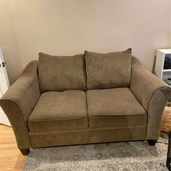 Small tan loveseat couch