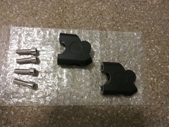 Handlebar pull back risers