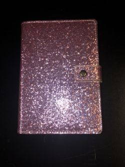 Heidi Swapp personal size pink glitter planner. I used/decorated only 3-4 pages