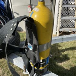 Scuba TankCan be used to refill air in tires paint ball scuba diving  With back harness  $45   Located freeport NY   * Click on my name to check out m