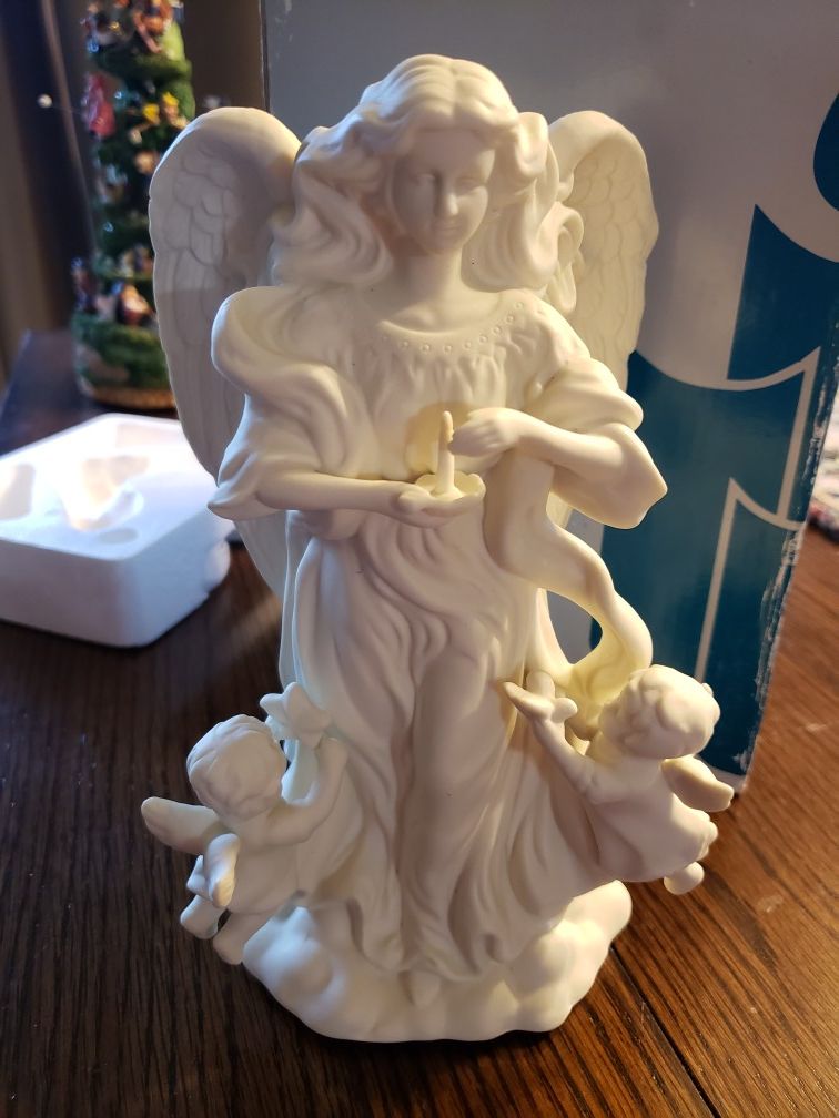 Angel of light candle holder
