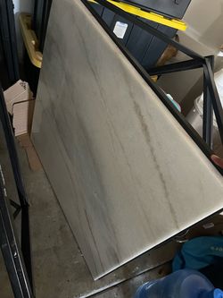 Marble top coffee table with metal black base