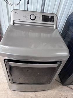 LG front load electric Dryer very large capacity 7.3 ft.³ in good working order