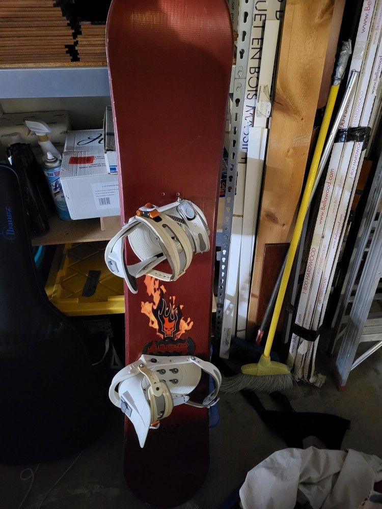 Snow Board With Burton Bindings Snow Pats 2 Pairs of Boots And A Helmet With Snow Jacket And Pants Package Deal
