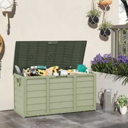 Green Solaura 75-gallon outdoor storage deck box