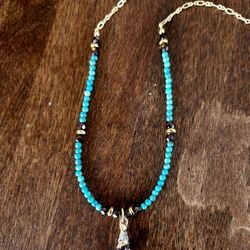 Turquoise Gold Banded Cinerea Shell Necklace