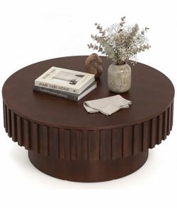 Round coffee table with storage