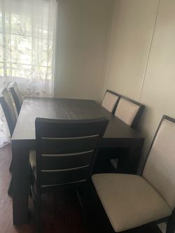 Table with 6 chairs and two 18” leaves