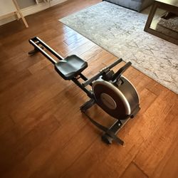Merach Rowing Machine