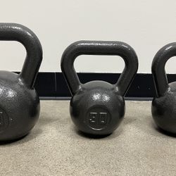 Kettlebells (new) - (1) 50lb, (2) 30lb