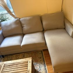 Grey Sectional With Reversible Chaise