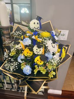 Graduation flowers and sash/lai