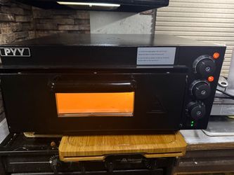Big Commercial pizza oven 16 1/2 inches, inside cooking  area, 662 F ,cook pizza,steaks, wings,
