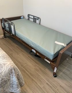 Full electric Hospital Bed with Mattress and Rails basically new