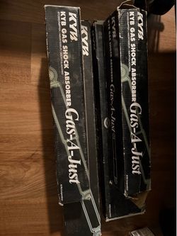 Chevy struts and boots front and rear sets